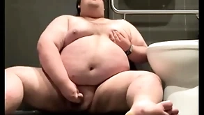 Chubby plays in pen up defecate
